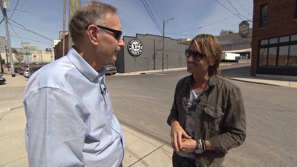 John Blackstone listens to Keith Urban in an interview for "CBS Sunday Morning."