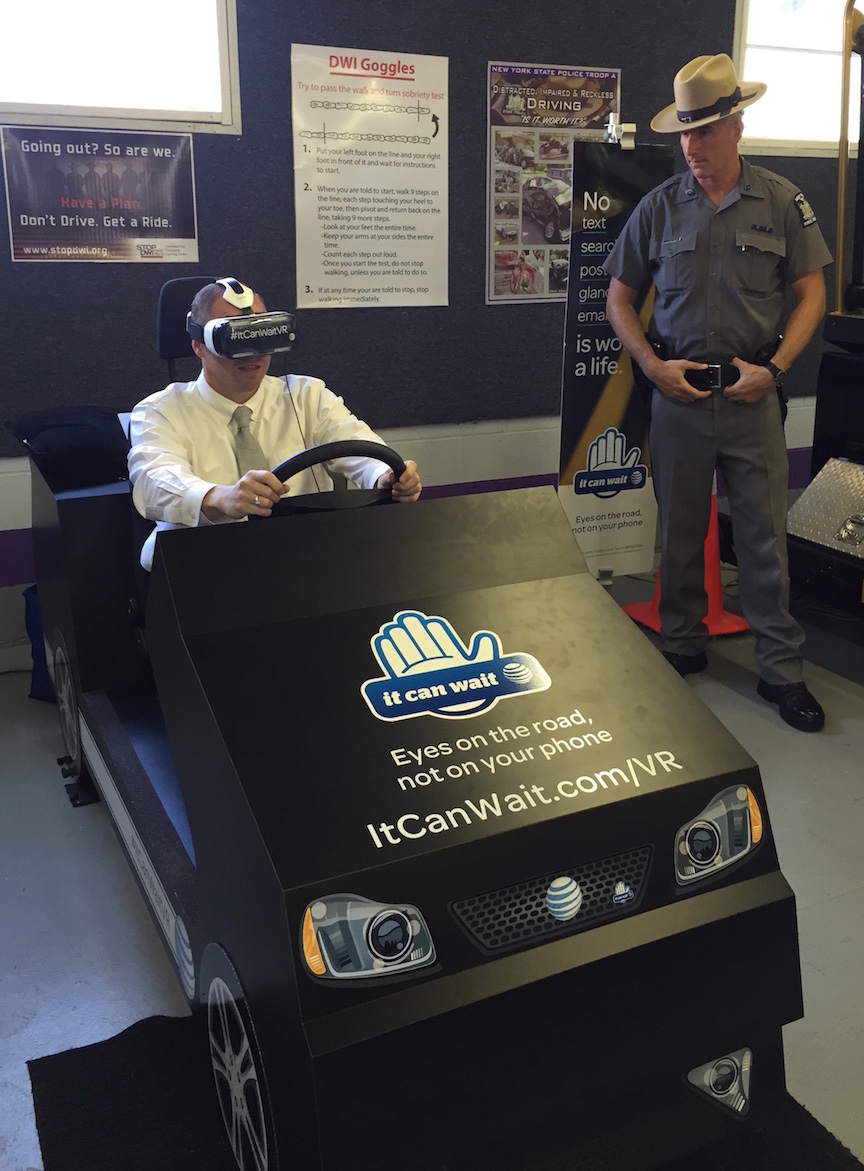 State Sen. Tim Kennedy tries the simulator.