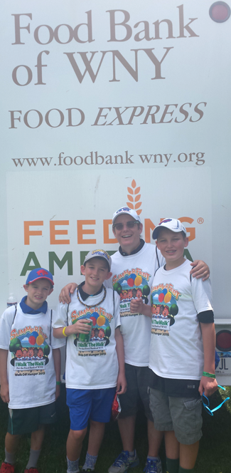 Pictured, from left: David, Charles, Tom and James Calderone at Walk Off Hunger.