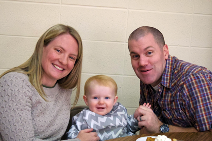 At left, David, Missy, and 14-month-old Grace Wilson.
