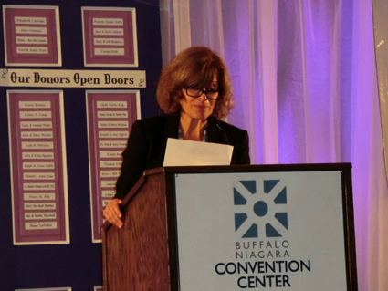 Mary Travers Murphy, executive director of the Family Justice Center, discusses issues connected with domestic violence at the Voices Ending Violence breakfast June 12 at the Buffalo Convention Center.