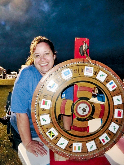 Jeanne Percival, captain of Huth's Heroes Relay For Life team, had a spinning prize wheel to raise money. (Photo by Alice Gerard)
