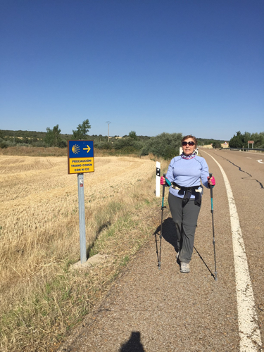 On Day 13 of her month-long journey, Zdenka Gast cools her weary feet. A typical day along the Camino de Santiago, or St. James Way, involves walking 10 miles or more in 100-degree heat mid-day along rugged terrain. Gast said she developed blisters the size of quarters.