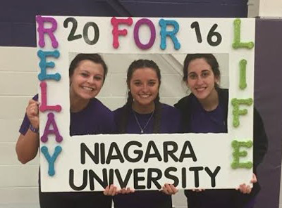 Members Morgan Miller, Elisha Nicosia and Meghan Barone support the fight against cancer.