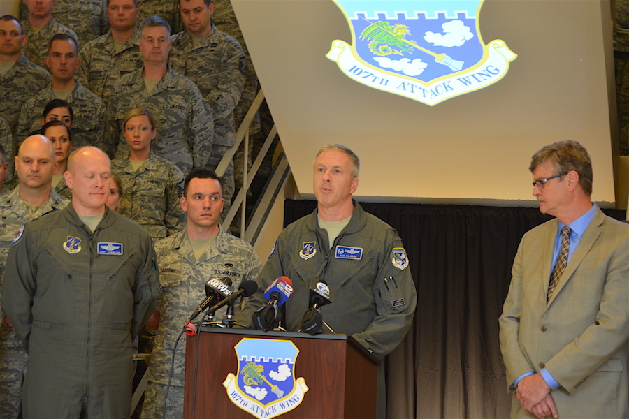 Col. Robert Kilgore, commander of the 107th Attack Wing, speaks about the wing's name change to members of the wing and local officials.