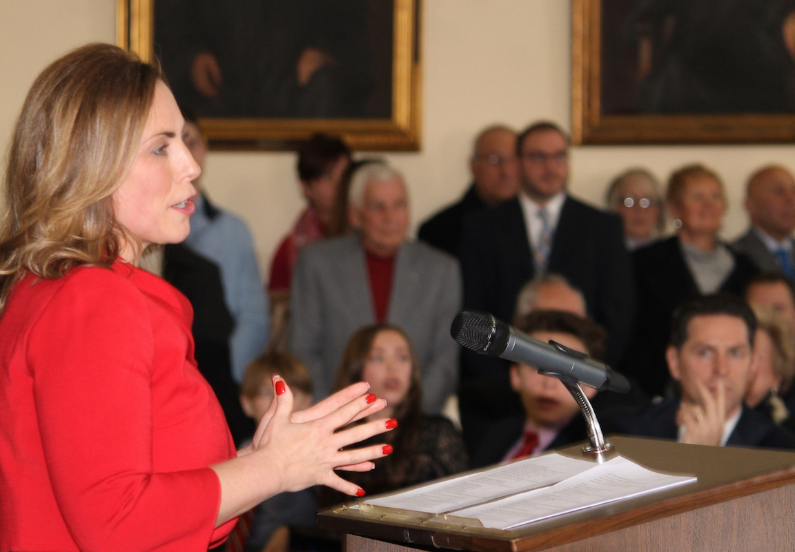 New Niagara County D.A. Caroline Wojtaszek outlines her vision for the Niagara County District Attorney's Office during her Dec. 31 inauguration as a crowd of 150 well-wishers looks on.