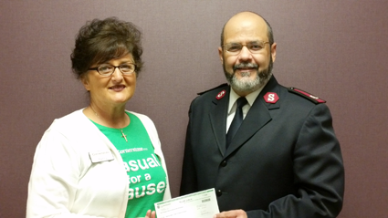 Pictured, from left: Nancy Baes of Cornerstone and Maj. Jose Santiago of the Lockport Salvation Army.
