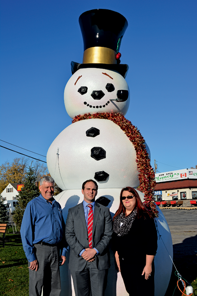Town of Niagara Business and Professional Association President Anthony L. Restaino (center) stands with Frosty Niagara project participants David Dorato of Cecconi's Joe Cecconi's Chrysler Complex and Janelle Zasucha of the Greater Niagara Federal Credit Union.