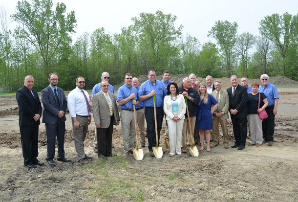 Ivy Lea Construction administrators, along with local officials and supporters, break ground at the company's new site at 765 Walck Road, North Tonawanda. (Photos by Lauren Zaepfel)