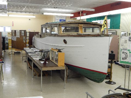 A 25-foot-long Little Giant cabin cruiser, made by the Richardson Boat Co. of North Tonawanda, is shown at the North Tonawanda History Museum.