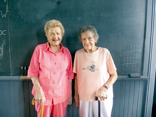 Lillian DuBois and Edna Walck of the Town of Niagara attended Niagara School No. 2, now a museum, when they were children. (Photo by Jill Keppeler)