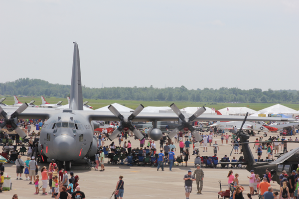 Shown is a C-130 military aircraft surrounded by spectators at the Thunder of Niagara Air Show. (File photo)