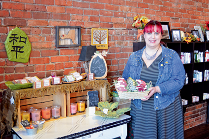Heather Kalisiak presents holiday-shaped soaps among several other homemade bath and body products.