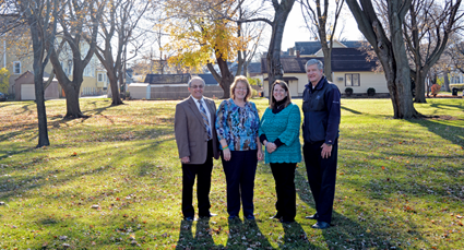 Pictured are North Tonawanda Mayor Arthur Pappas and Children's Remembrance Gardenwalk committee members at the future gardenwalk's site.