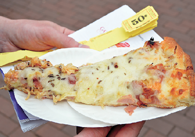 Shown is a slice of TC Wheelers Reuben pizza. The specialty pizza will be offered at Pizza Fest and was voted 