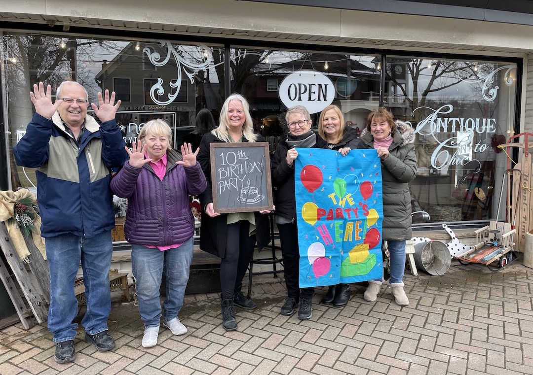 Pictured outside Antique to Chic, from left: Russ Piper, Jackie Carbone, JoAnn Simon, Judy Munzi, Patti Tweed and Judi Muoio.