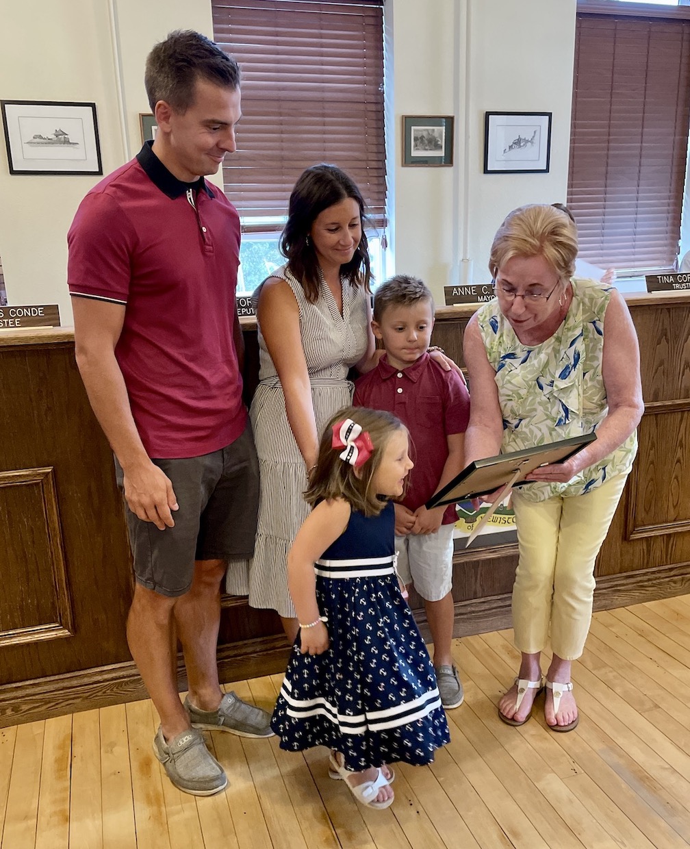 Joel and Maryjo Erway, honored Monday for their service to soldiers, are pictured with Dominic and Leah Erway, and Village of Lewiston Mayor Anne Welch.