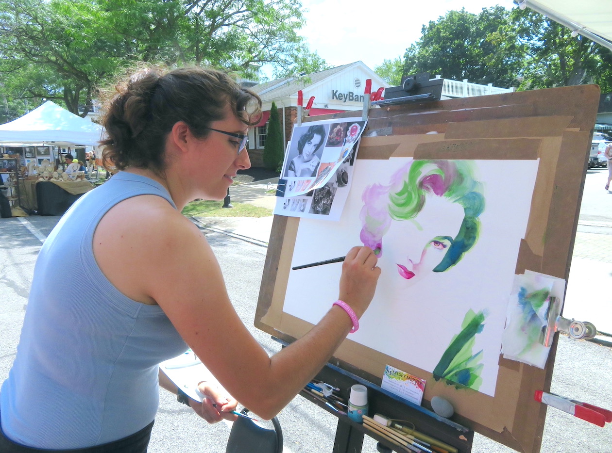 Pictured is an artist painting Elizabeth Taylor at the Lewiston Art Festival. (Submitted photo)