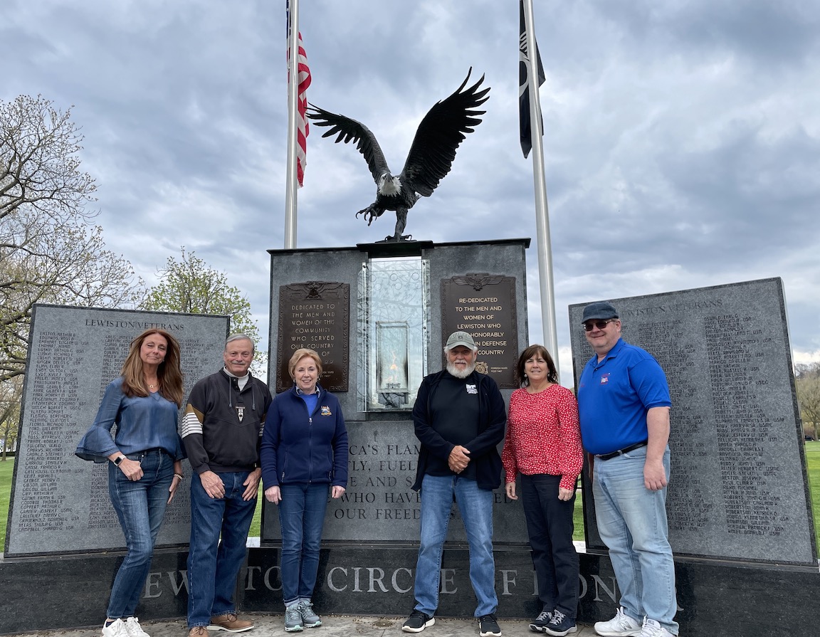 Members of the Memorial Day committee recently gathered for a photo and a meeting. For the first time since 2019, the Memorial Day parade will return to Center Street in the Village of Lewiston. Following the procession, Veterans of Foreign Wars Downriver Post 7487 will hold its annual observance ceremony at the `Circle of Honor` monument in Academy Park. Standing in front of the eternal flame at the `Circle of Honor,` are from left, Bonnie Myers, Village of Lewiston Deputy Mayor Vic Eydt, Village of Lewiston Mayor Anne Welch, VFW Quartermaster Vince Canosa, Village of Lewiston Trustee Tina Coppins and Dean Beltrano.