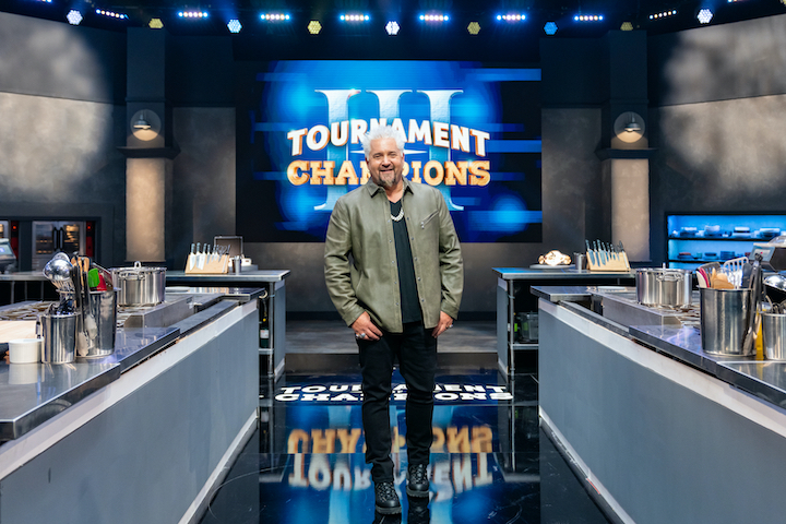 `Tournament of Champions` host Guy Fieri on the `TOC` season three set. (Food Network photo)