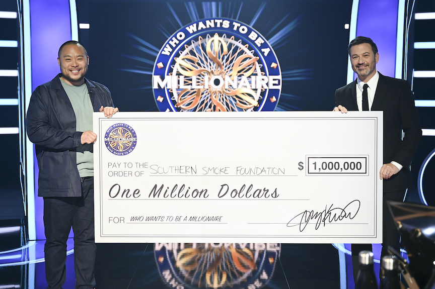 `Who Wants To Be A Millionaire` `The Million-Dollar Win` - Chef and celebrity contestant David Chang, left, is pictured with host Jimmy Kimmel following his $1 million win. (ABC photo by John Fleenor)
