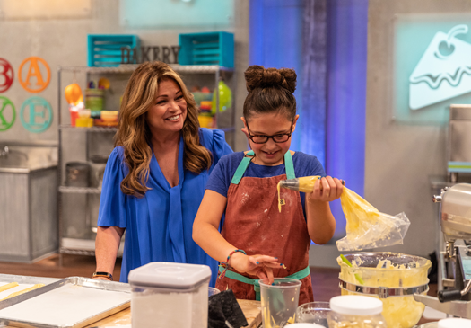 Issi Neufeld with Valerie Bertinelli on Food Network's `Kids Baking Championship.` (Food Network photo)