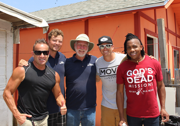 Pictured on the Baja Christian Ministries/God's Not Dead Missions work site in Baja, Mexico, are, from left, Newsboys' Duncan Phillips; Eric Prager, executive director, Baja Christian Ministries; Bob Sanders, founder, Baja Christian Ministries; God's Not Dead Missions Director and musician, Adam Agee; and Newsboys' Michael Tait.