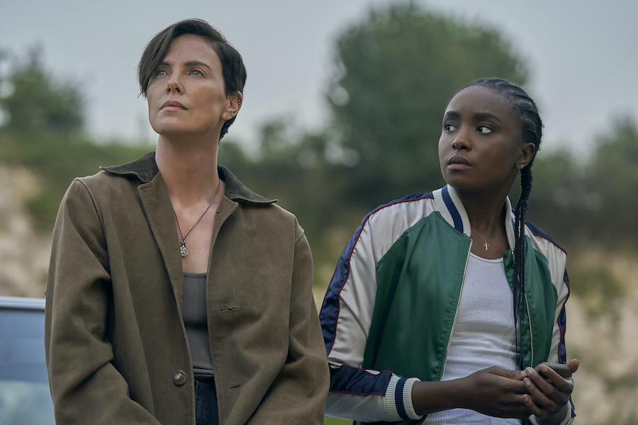 Charlize Theron (Andy) and Kiki Layne (Nile) star in `The Old Guard` on Netflix. A sequel was announced. (Photo credit: Aimee Spinks/Netflix ©2020)