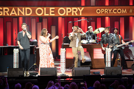 Ryan Hurd joined Lady A for their hit he co-wrote, `What If I Never Get Over You.` (Photo by Chris Hollo/ image courtesy of Grand Ole Opry LLC/ Schmidt Relations)