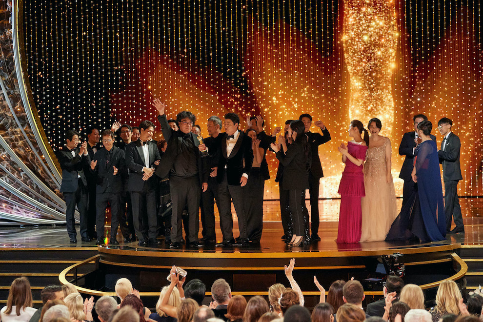 The cast and crew of `Parasite` accept the Academy Award for Best Picture during the live ABC Telecast of The 92nd Oscars at the Dolby Theatre in Hollywood on Sunday, Feb. 9. (Photo credit: Blaine Ohigashi/©A.M.P.A.S.; courtesy of the official Oscars website)