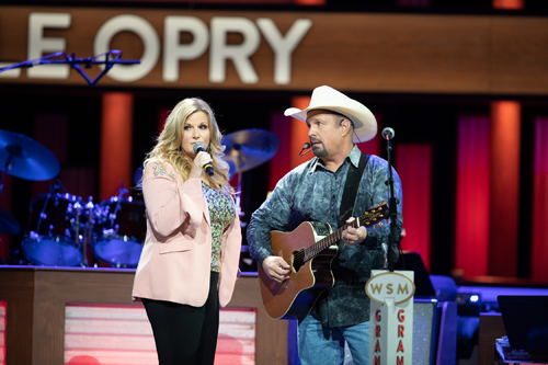 Trisha Yearwood and Garth Brooks celebrate the milestone. (Photo by Rachael Black/courtesy of Grand Old Opry/Schmidt Relations)