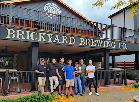Pictured from left are BBC Master brewers Tom Winter and John Meteer, artist and speaker Thomas Paul Asklar, BBC co-owner Ken Bryan, musician Dave Thurman, RMS owner Paul Beatty and designer Rob Hopkins.