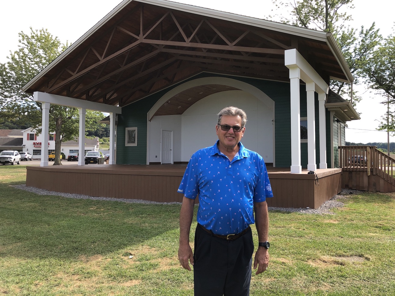 Anthony DiMino stands in front of the new Alphonso DiMino Memorial Bandshell at Academy Park in Lewiston.