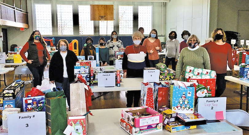 Dozens of volunteers teamed up last year to help make the annual Youngstown Christmas Basket program campaign `a great success.` (Submitted photo)