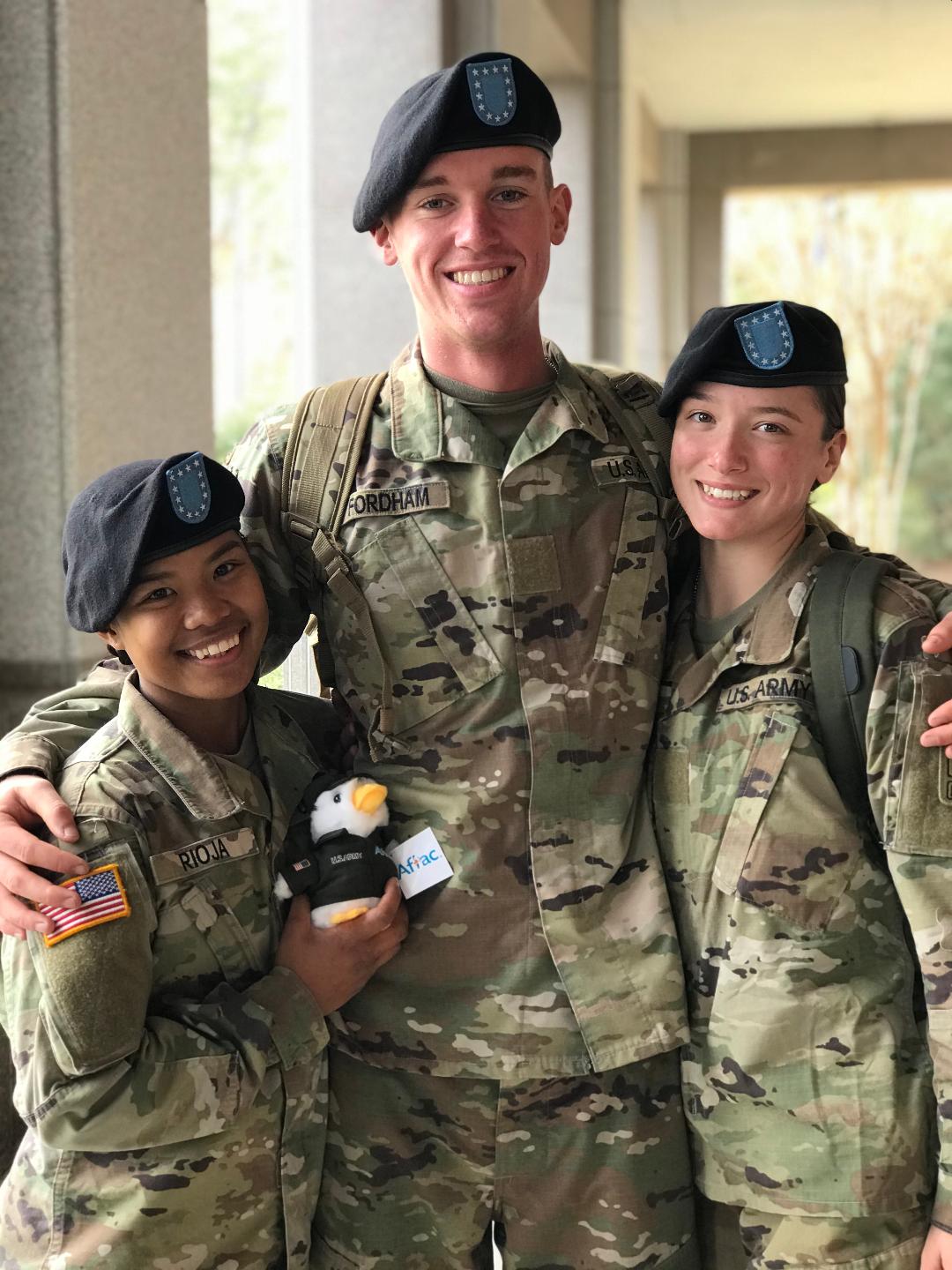 Hannah Mergi at U.S. Army infantry training. She is pictured, right, with privates Fordham from Texas and Rioja from Guam. (Photo courtesy of Melissa Fincher Mergi)