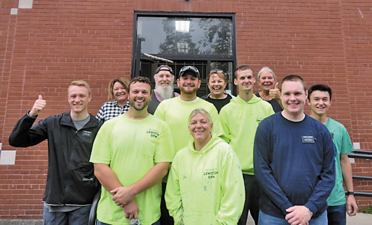 Lewiston Council on the Arts `wishes to thank these strong, energetic and helpful individuals that are helping us move to our new location at the Red Brick School.` In the photo, front and center: Jennifer Rossman; second row: Elder Brennan Jensen, Travis Mis, Nate Meigs, Robert Haskell, Elder Matthew Floodeen and Elder Nathaniel Blake; and back row: LCA staffers Kathryn Serianni, Tim Henderson, Irene Rykaszewski and Eva Nicklas. (Photo courtesy of the LCA)