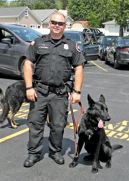 Lewiston Police Department officer Scott Stafford and K-9 Shadow.