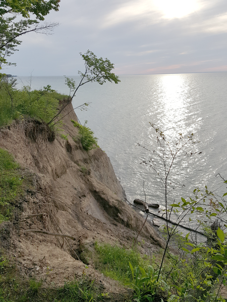 A view of Lake Ontario waters and the erosion impact from last year's record flooding. (Photo by Terry Duffy)