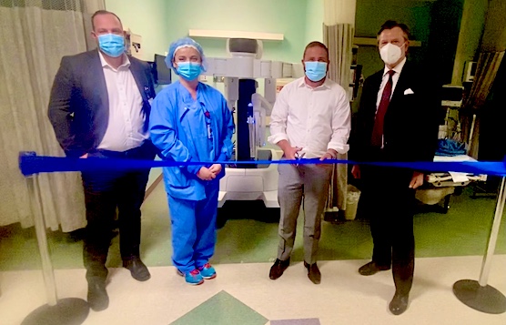 Celebrating the upgraded robot, from left: David Brown, Catholic Health system director, perioperative business services; Amy Vanone, assistant director of perioperative services, Mount St. Mary's; Thomas Greico, director of operations, Mount St. Mary's; CJ Urlaub, President, Mount St. Mary's. (Submitted)