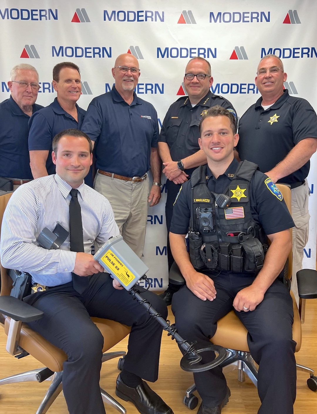 Pictured, back row: Niagara County District 3 Coroner James Carroll, Robert Trunzo and Mike McInerney with Modern Disposal gather with Sheriff Michael Filicetti and Lt. James Lucas. Front row: Investigator Keith Hetrick and Deputy Tyler Magliazzo from the underwater recovery team.