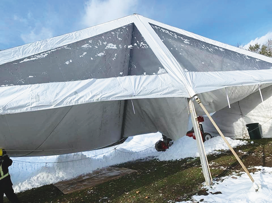 Shown is damage to the Lewiston Family Ice Rink warming tent resulting from Monday's snowstorm. The tent's status for opening day is in questions, and community assistance is sought. (Photos courtesy of Tom Deal)
