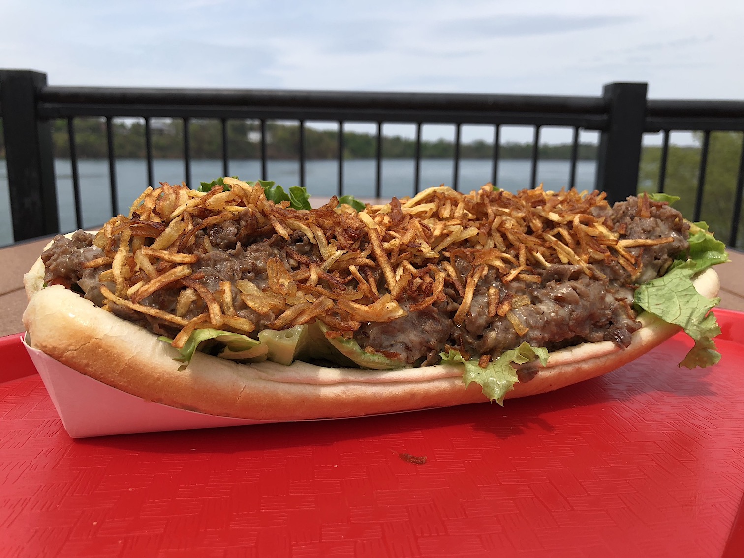 The Silo Restaurant's signature `HayStinger` sandwich. It's a ribeye steak and cheese sandwich ... with crispy potato strings ... and chicken fingers.