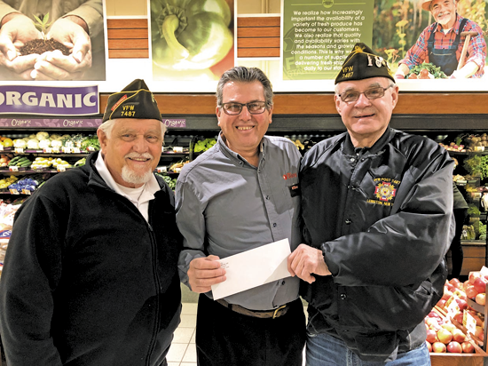 DiMino Lewiston Tops regularly gives back to VFW Down River Post 7487. Pictured, from left, are Vince Canosa, Anthony DiMino and Bill Justyk. (File photo)