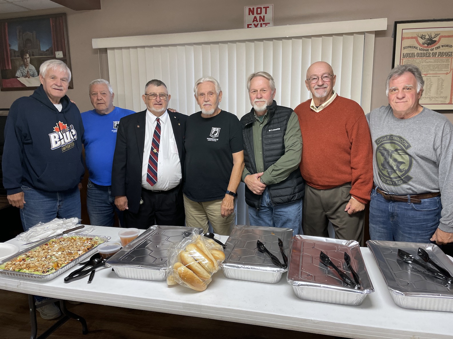Members of Veterans of Foreign Wars Downriver Post 7487 prepare lunch for their honored guests.