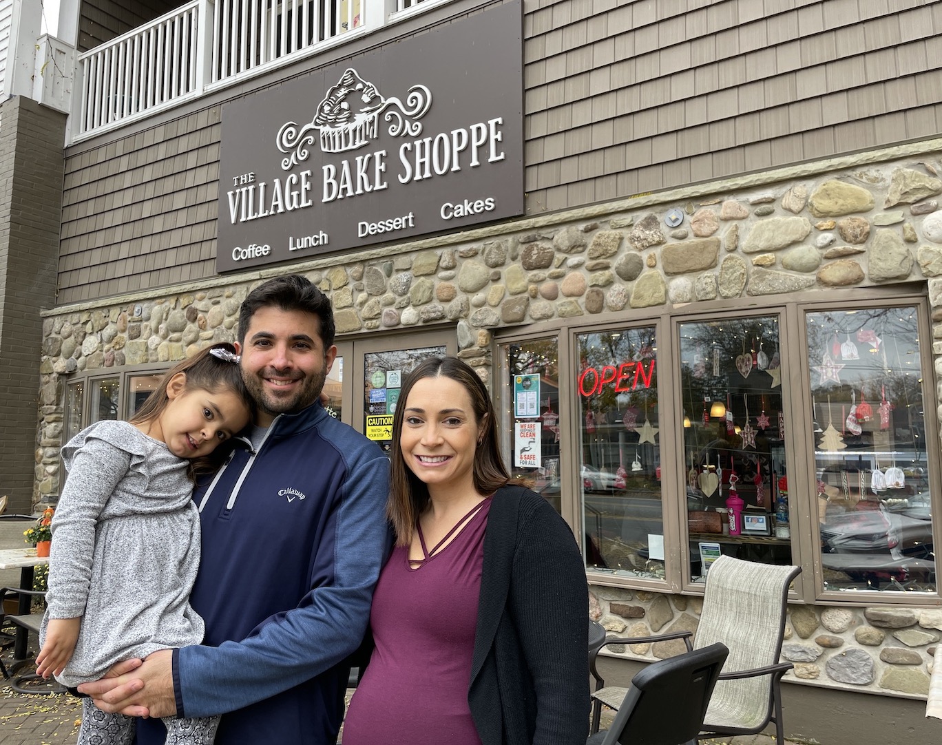 Mike, Lindsay (with baby No. 2) and Jeana Fiore celebrate their first decade at The Village Bake Shoppe in Lewiston.