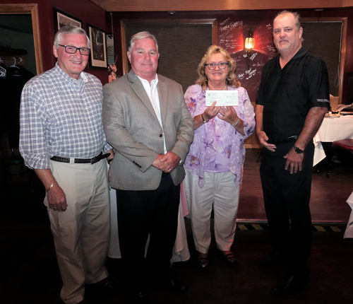 The Town of Porter visited with a $1,500 check presentation to YBPA officials. Shown (Left to right) YBPA secretary Mark Butera, Town of Porter Councilman Tim Adamson, YBPA President Cheryl Butera, and Town of Porter Supervisor John `Duffy` Johnston. (Photo by Kevin and Cobello, K&D Action Photo and Aerial Imaging).