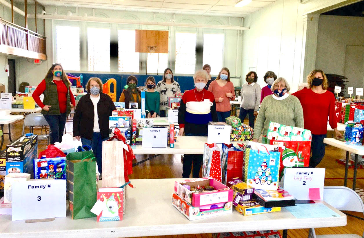 Christmas Baskets Program volunteers from throughout Youngstown and Porter help wrap and organize children's gifts. (Submitted photo).