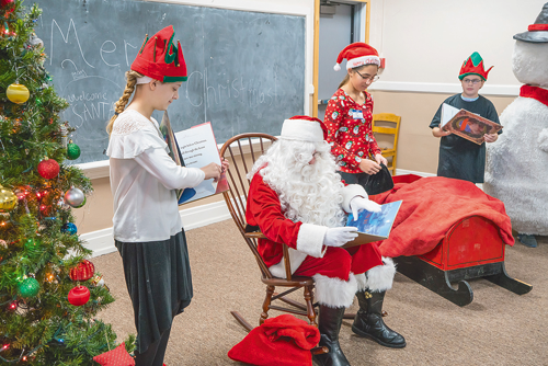 Look for visits with Santa and storytelling at the Youngstown Recreation Department's children's Christmas party. (File photo).
