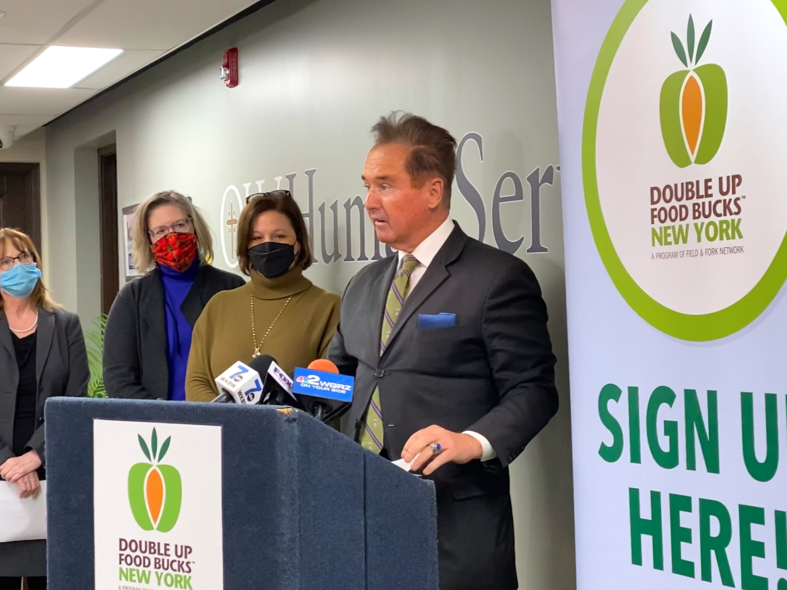 Pictured at a press conference are Cindy Lee of OLV Human Services, Tara Ellis of FeedMore WNY, Lisa French of Field & Fork, and Congressman Brian Higgins. (Submitted photo)