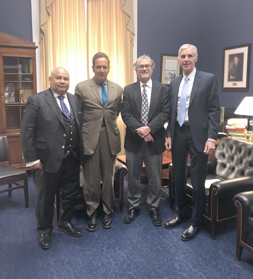 From left: The Rev. Kinzer Pointer, Rep. Brian Higgins, Dr. Eliseo Pérez-Stable and Dr. Tim Murphy.